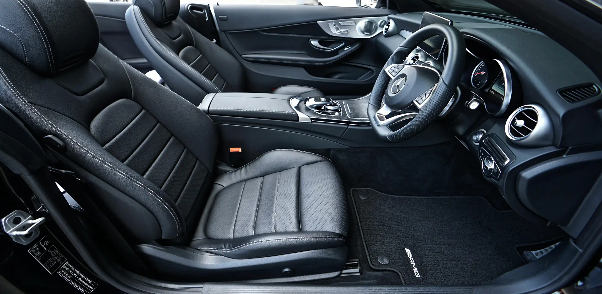 car interior- Leather Vs Fabric in car detailing